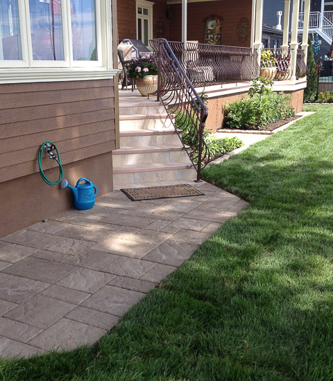 Installation de trottoir en pavés unis